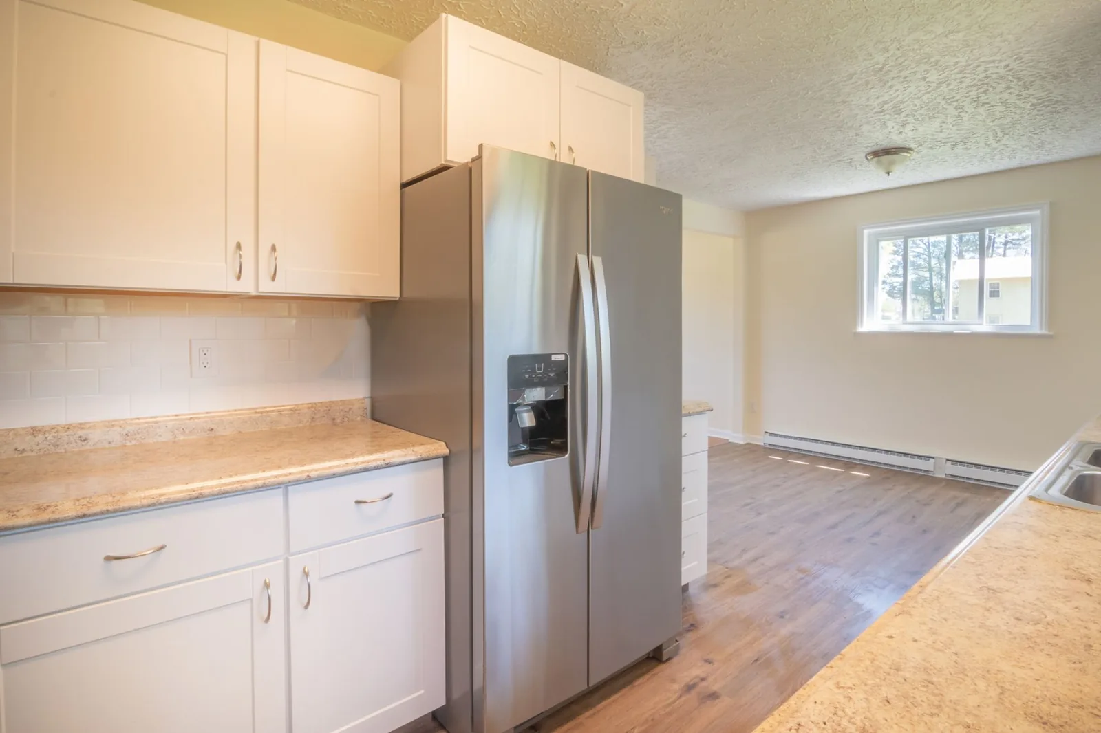 Kitchen remodel vs refacing cost comparison on newly surfaced cabinets