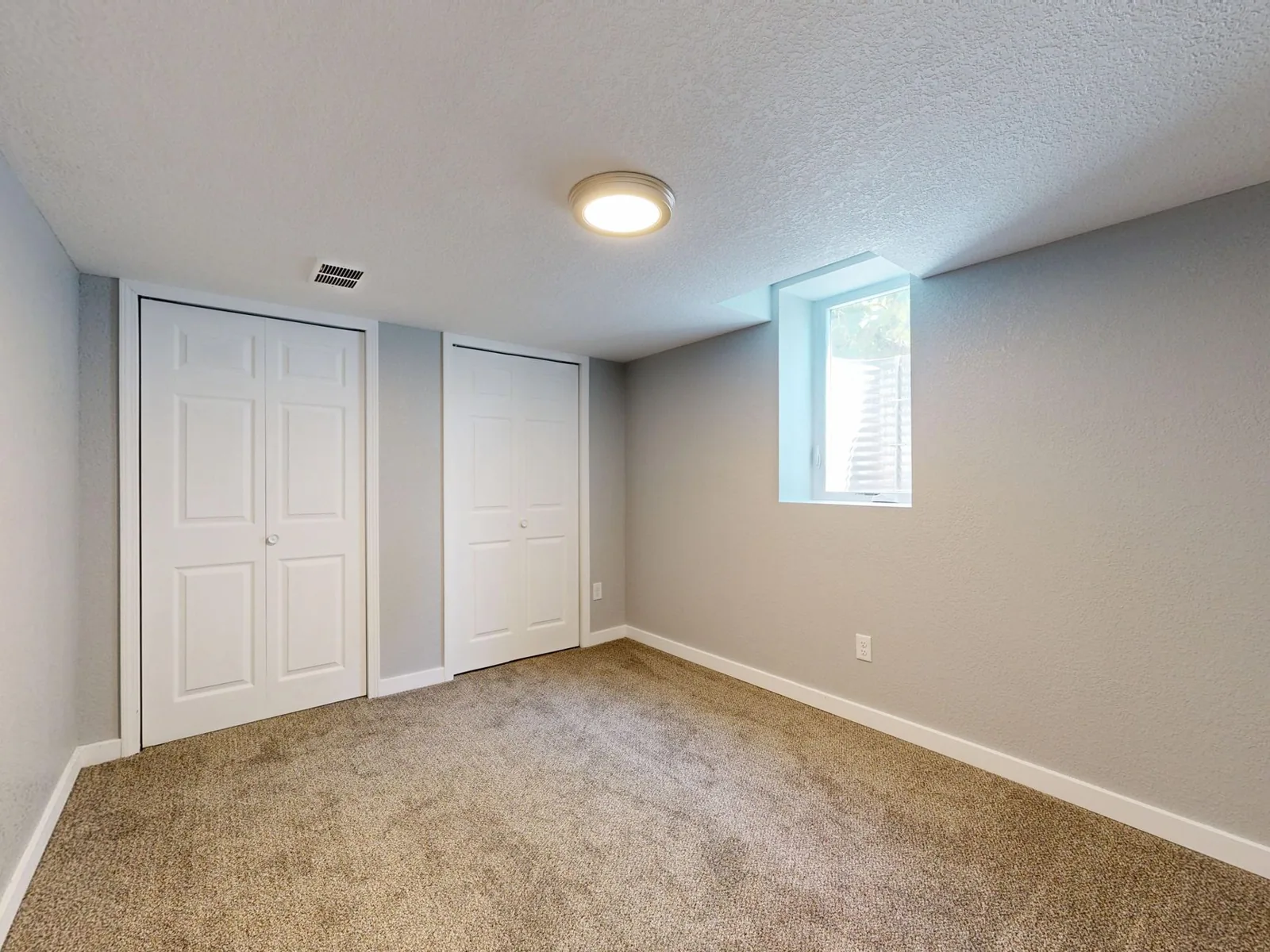 How much does it cost to finish a basement with a full bathroom and custom finishes