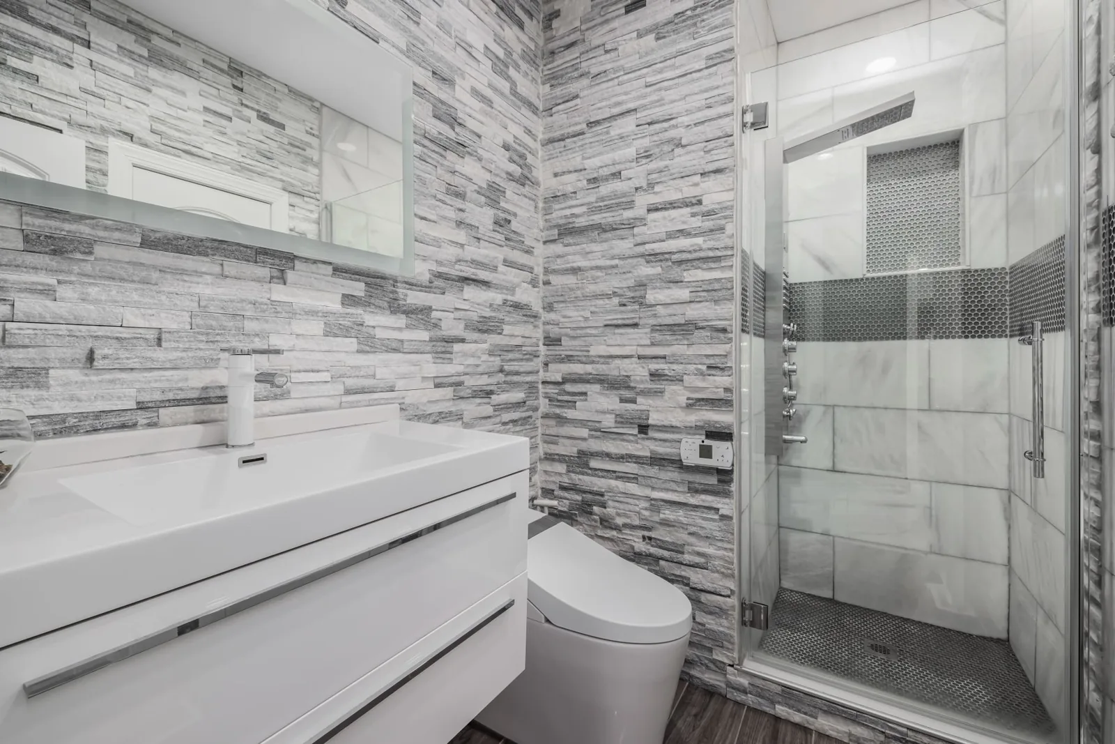 modern bathroom with tiled shower