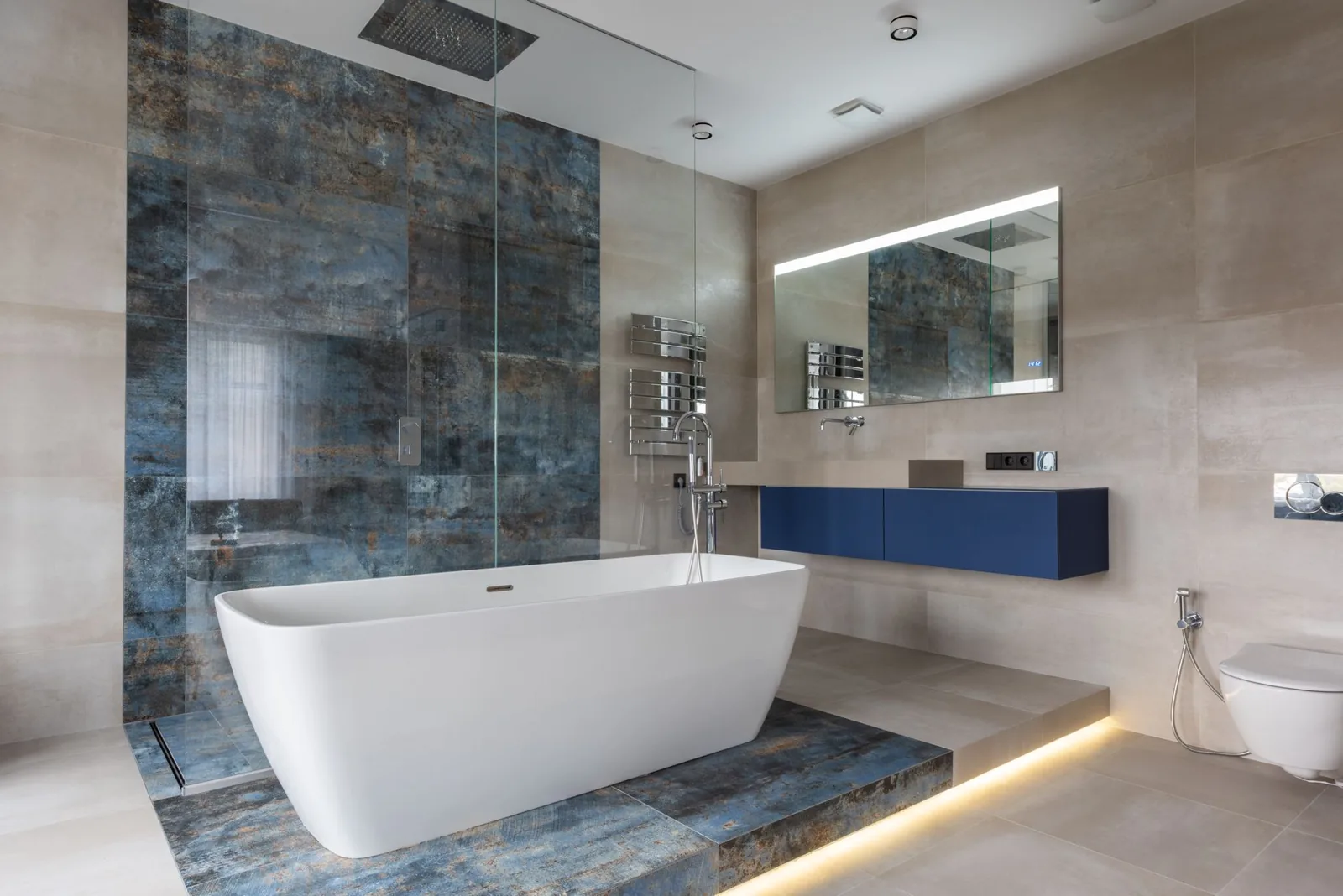walk-in shower with frameless glass enclosure