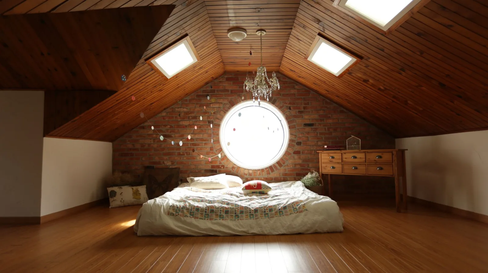 finished attic bonus room with skylight and built-in shelving